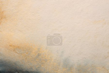 Photo for Gray, Beige, gold glitter ink watercolor smoke flow stain blot on wet paper grain texture background. - Royalty Free Image