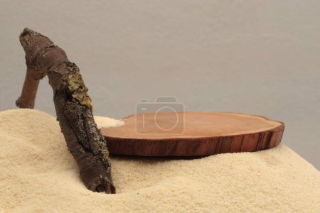 Photo for Dry wooden stump platform podium, branch snag log  on beige sand background. Minimal empty display product presentation scene. - Royalty Free Image
