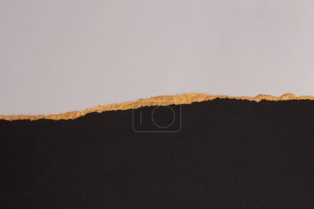 Malwand aus Papier in Gold, Beige und Schwarz. Abstrakte Textur Kopierraum Hintergrund.