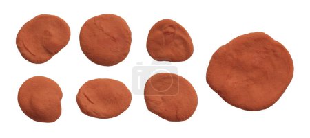 Color beige brown terracotta plasticine modelling clay handmade texture frame blot isolated on white background.