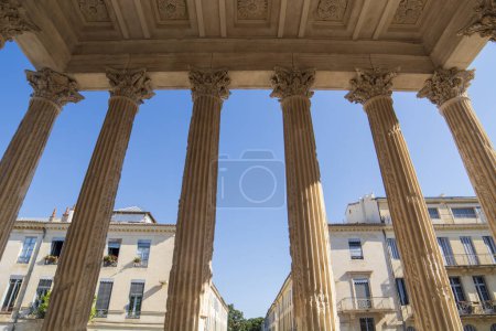 Nimes, Maison Carre, ancient roman temple, important landmark in France, lateral detail