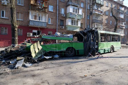 Photo for KYIV, UKRAINE, MARCH 20, 2022: After bombing. War in Ukraine. Russian missile destroyed trolleybus in Kyiv city on March 14, 2022. Terror and genocide of Ukrainian people. Russia - terrorist country - Royalty Free Image