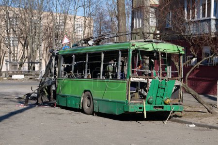 Photo for After bombing. War in Ukraine. Russia - terrorist country, destroyed by a missile trolleybus in Kyiv city on March 14, 2022. Russia - terrorist country. Terror and genocide of Ukrainian people - Royalty Free Image