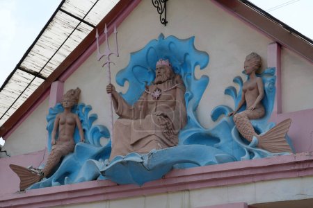 Photo for IVANO-FRANKIVSK, UKRAINE, AUGUST 22, 2022: Neptune and mermaids. Bas-relief on the old building in Ivano-Frankivsk city, western Ukraine - Royalty Free Image