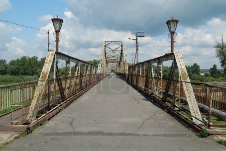 Photo for Old metal bridge across the Dniester river in the city of Galich or Halych, western Ukraine - Royalty Free Image