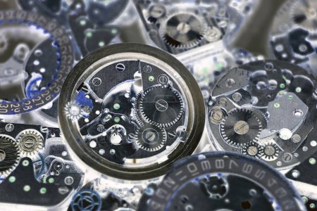 Photo for Clockwork details and parts, macro shots. Old mechanical watches with gears and cogs. Watch or clock mechanisms, extreme close-up. Time or repair concept - Royalty Free Image