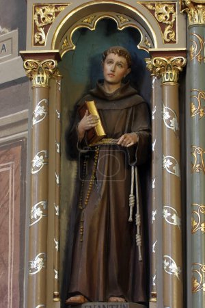 Foto de Saint Anthony of Padua, statue on the altar of Saint Florian in the church of the Saint Peter in Ivanic Grad, Croatia - Imagen libre de derechos