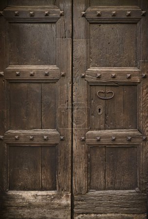 Photo for Wooden old entrance to house.  antique textured front door - Royalty Free Image