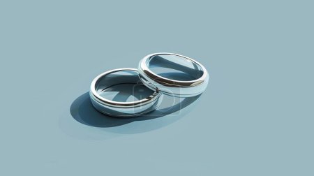 Anneaux de mariage minimalistes au design plat sur un fond bleu pastel