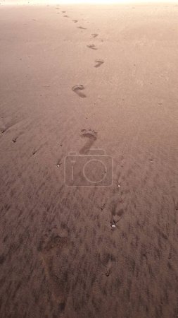 Photo for Footprints in sand showing legacy - Royalty Free Image