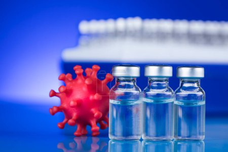 Foto de Botellas vacuna contra el coronavirus, antecedentes pandémicos - Imagen libre de derechos