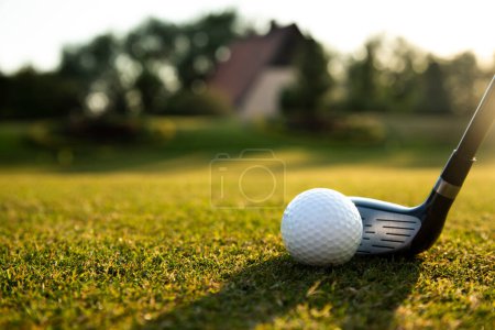 Photo for Golfer hitting the club on tee - Royalty Free Image