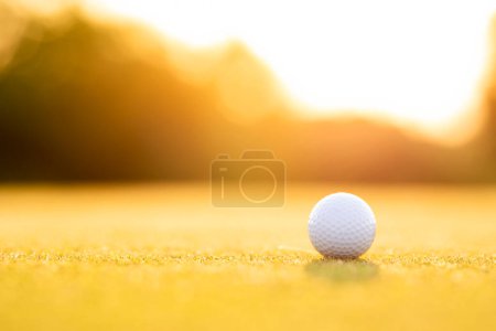 Photo for Golf ball on green grass on golf course - Royalty Free Image