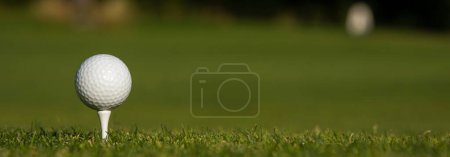 Photo for Golf ball on tee - Royalty Free Image