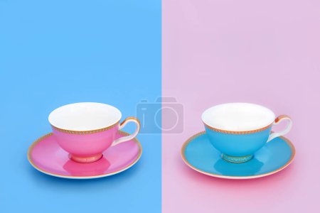 Photo for Tea for two with porcelain tea cups. Elegant luxury drinking duality reflection concept set on pastel baby blue and pink background. Minimal zen composition. - Royalty Free Image