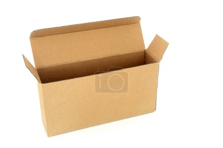 Photo for Slimline brown cardboard rectangular shape box on white background. Environmentally friendly recycled reusable material for delivery parcel package. - Royalty Free Image