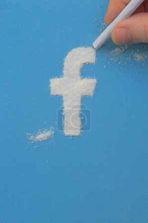 Photo for Concept of Facebook social media addiction like drugs - Royalty Free Image