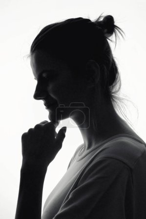 Photo for Closeup Profile Of A Woman Silhouette Isolated in Studio - Royalty Free Image
