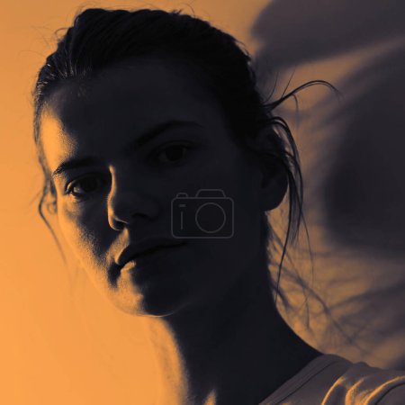 Photo for Closeup Profile Of A Woman Silhouette and Sunlight Isolated in Studio - Royalty Free Image