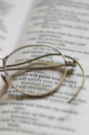 Photo for Hope concept. Closeup Reading Glasses On Open Bible - Royalty Free Image