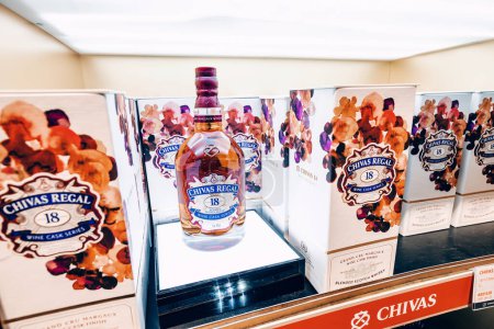 Photo for 20 January 2023, Dubai, UAE: Chivas Regal malt whiskey for sale at airport duty free alcohol store - Royalty Free Image