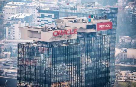 Photo for 15 March 2024, Sarajevo, Bosnia and Herzegovina: modern office buildings with Microsoft and Oracle's advertisement banners as a symbol of the city's growing presence in the technology industry. - Royalty Free Image