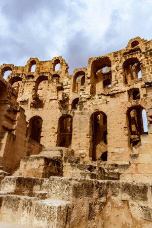 Photo for Ruins of the largest coliseum in North Africa. Demolished ancient walls  Roman amphitheatre at El Djem, Tunisia, Nord Africa - Royalty Free Image