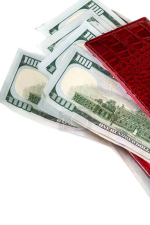 Photo for American money - dollars  in a red wallet on a white background. - Royalty Free Image