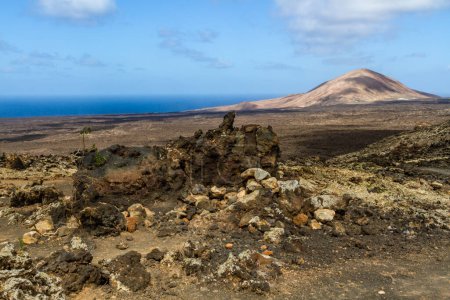 Hiking trail to Caldera Blanca. "Sea of Lavas" (Mar de Lavas ), Barren and stony huge field of  lava. Los Volcanes Natural Park, Lanzarote, Canary Islands, Spain