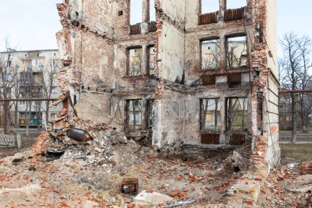 Photo for LYMAN, UKRAINE - Feb. 15, 2024: A destroyed apartment building is seen as a result of artillery shelling by Russian troops in Lyman, Donetsk reg. - Royalty Free Image