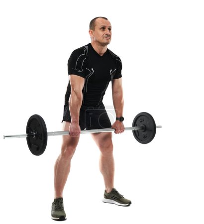 Photo for Athletic middle age man doing deadlift fitness workout with barbell, isolated on white background - Royalty Free Image