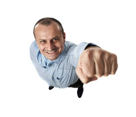 Photo for Successful businessman punching up his way towards success, isolated on white background - Royalty Free Image