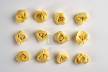 Photo for Tortellini stuffed Italian pasta isolated on white background - Royalty Free Image