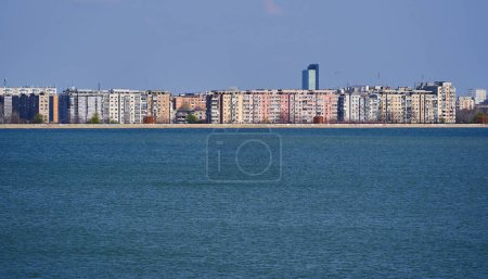 Photo for Modern urban development with apartment blocks on the shores of a beautiful lake - Royalty Free Image