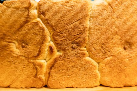 Photo for Texture of bread with brown baked color, closeup image - Royalty Free Image