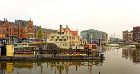 Photo for AMSTERDAM, NETHERLANDS - August 24, 2023: Amsterdam is the Netherlands capital, known for its artistic heritage, elaborate canal system and narrow houses with gabled facades. - Royalty Free Image