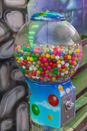 Photo for Large Gumball Machine Candy Dispenser at Fun Fair Festival - Royalty Free Image