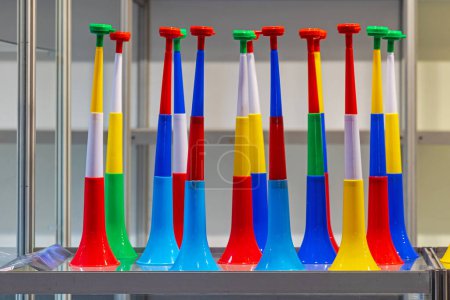 Téléchargez les photos : New Long Colourful Plastic Vuvuzela Horn for Sale at Shelf - en image libre de droit
