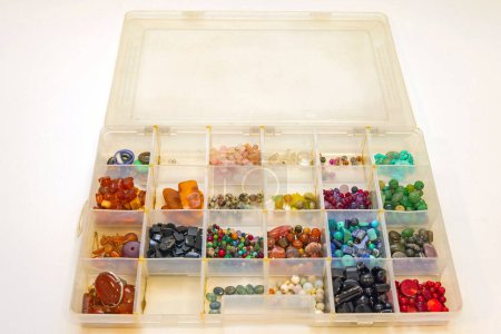 Foto de Semi Precious Gemstones Jewelry Craft Material in Open Tackle Box - Imagen libre de derechos