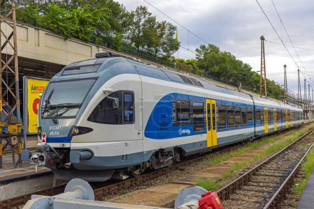 Foto de Budapest, Hungary - July 31, 2022: Mav Start Regional Transport at Nyugati Train Station in City Summer Afternoon. - Imagen libre de derechos