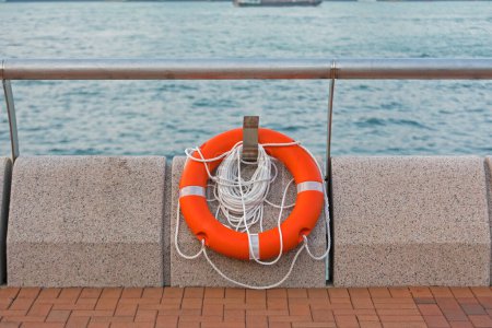 Photo for Life Preserver Lifebuoy  Ring Buoy at Sea Coast - Royalty Free Image