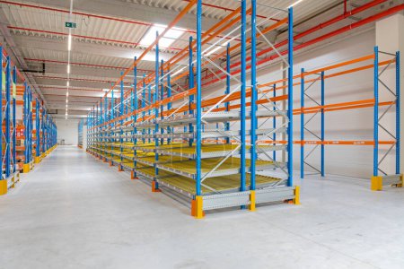 Gravity Flow Rack Shelving in Distribution Warehouse