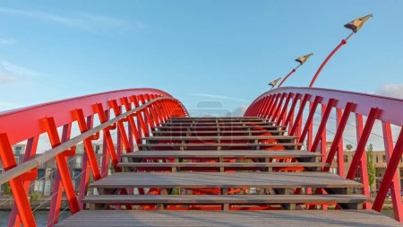 Photo for Wooden Deck Stairs at Red Python Bridge Eastern Docklands in Amsterdam - Royalty Free Image