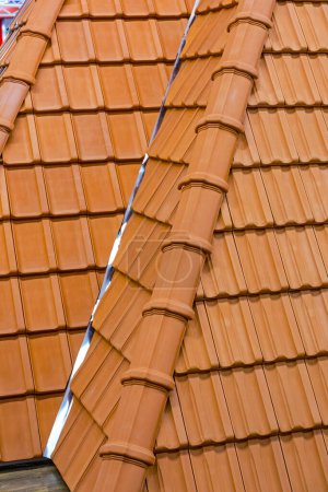 Photo for Interlocking Terracotta Ceramic Roof TIles at House - Royalty Free Image