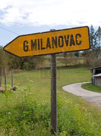 Photo for Gornji Milanovac, Serbia - October 07, 2018: Faded Direction Arrow Road Sign Way to Gornji Milanovac Town in Serbia. - Royalty Free Image