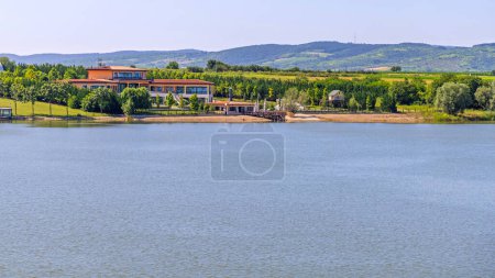 Photo for Ruma, Serbia - July 03, 2023: Novak Djokovic House at Pavlovac Lake Kurdos Summer Day. - Royalty Free Image