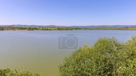 Photo for Calm Water at Pavlovac Lake Kurdos Summer Day Vojovodina - Royalty Free Image
