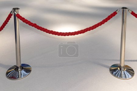 Photo for Red Rope Barrier Stanchions at Vip Event Venue - Royalty Free Image
