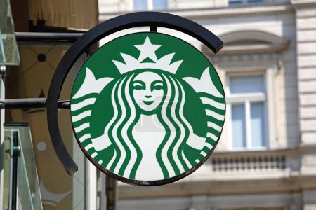 Photo for Vienna, Austria - July 12, 2015: Famous Starbucks Woman Sign at Coffee Shop Building in Capital City Centre. - Royalty Free Image