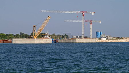 Photo for Venice, Italy - July 08, 2011: Construction Site Building Seawall MOSE Project for Flood Protection in Lagoon. - Royalty Free Image